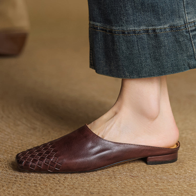 Comfortable leather mules with woven detailing and cushioned soles