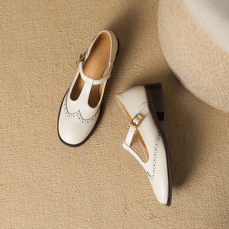 Women's dress shoes showing the full heel profile