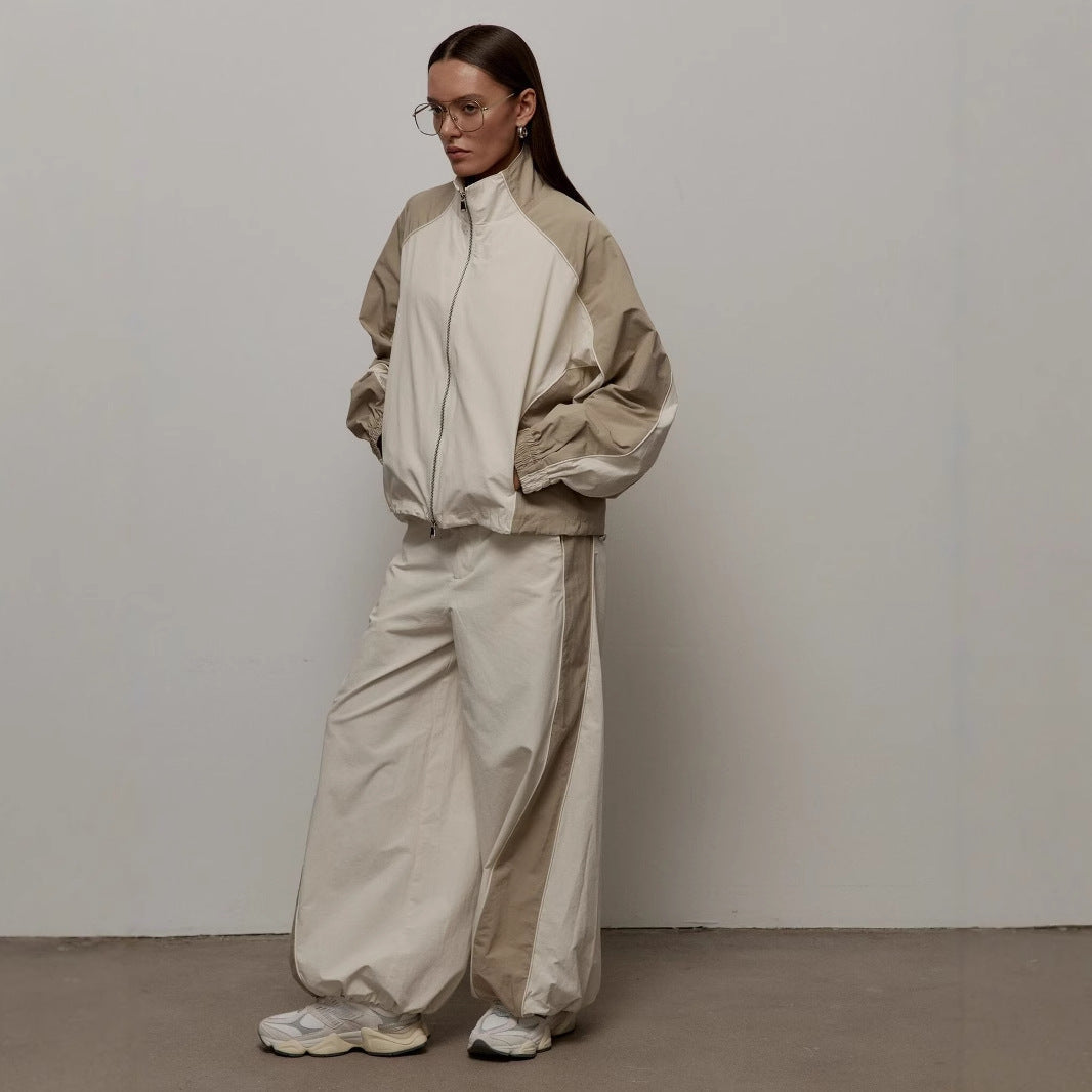 Women's track jacket featuring an oversized fit and raglan sleeves