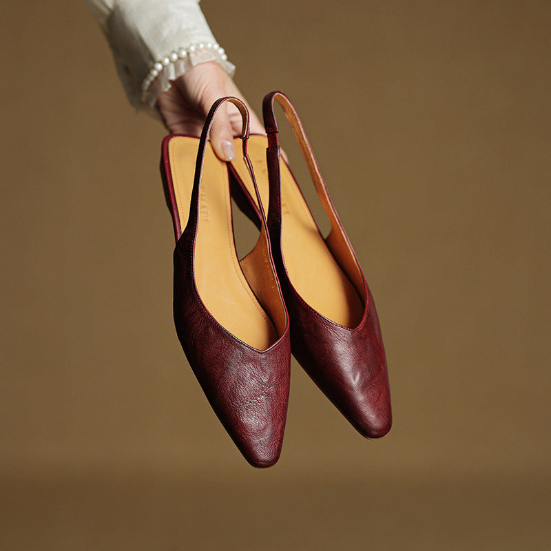 Slingback strap and open heel detail on genuine leather flats