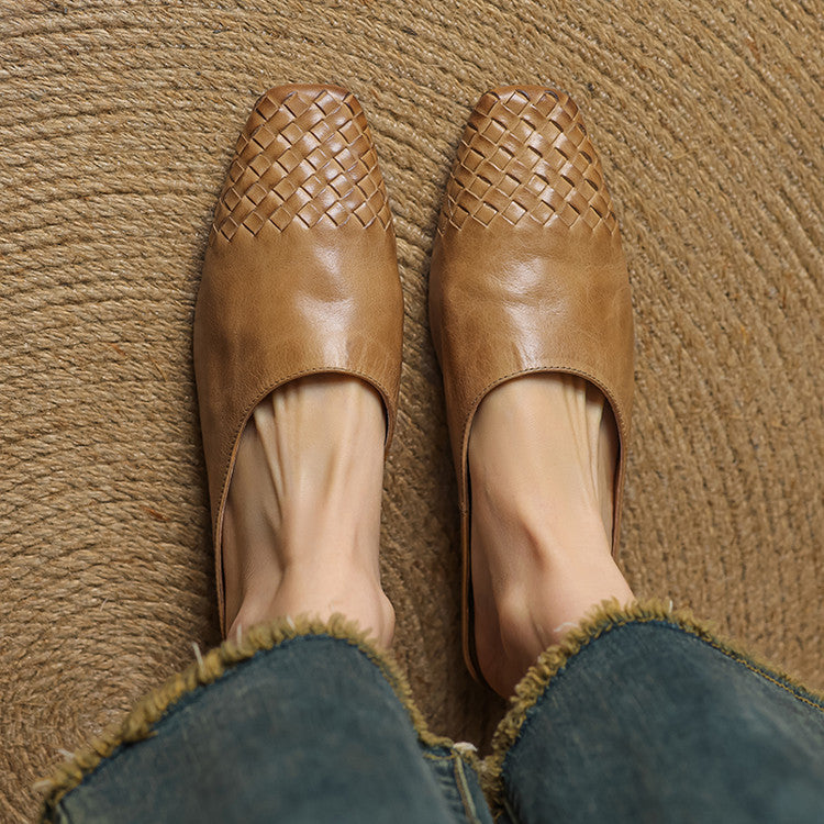 Side view of backless leather mules with a low profile