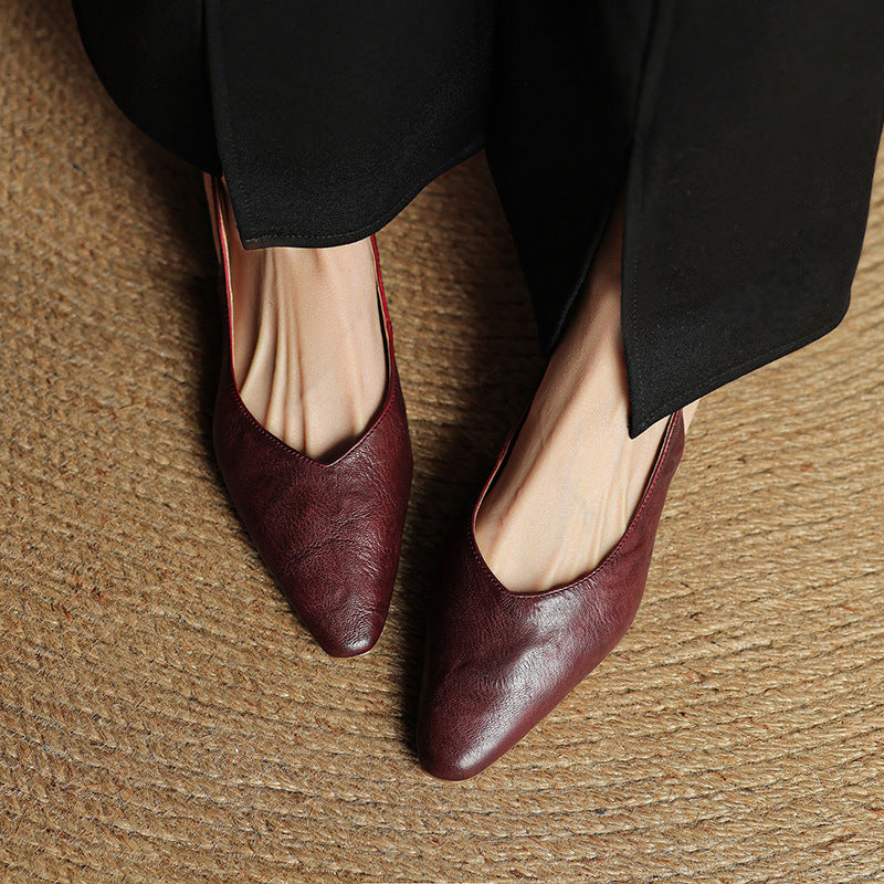 Pair of genuine leather slingback flats displayed together