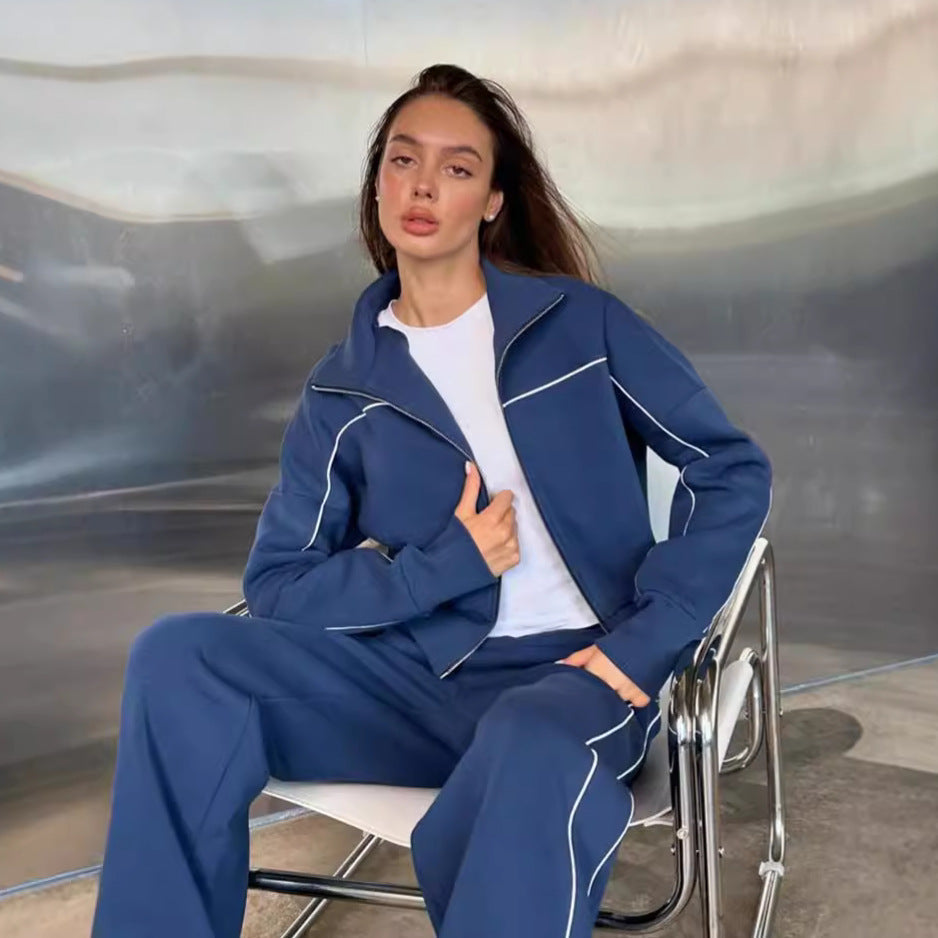 Women's coordinated lounge outfit featuring a zip jacket and matching pants