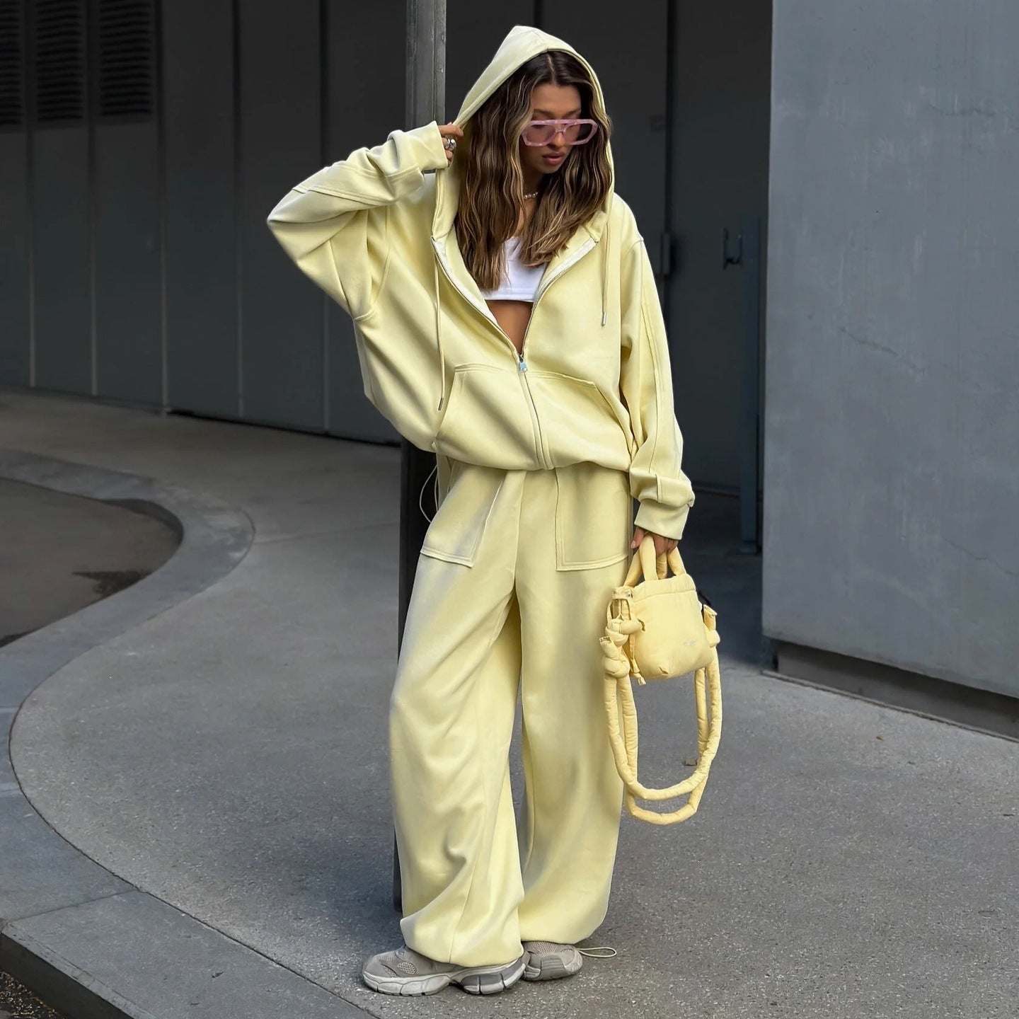 Hooded women's zip-up jacket with a relaxed oversized fit