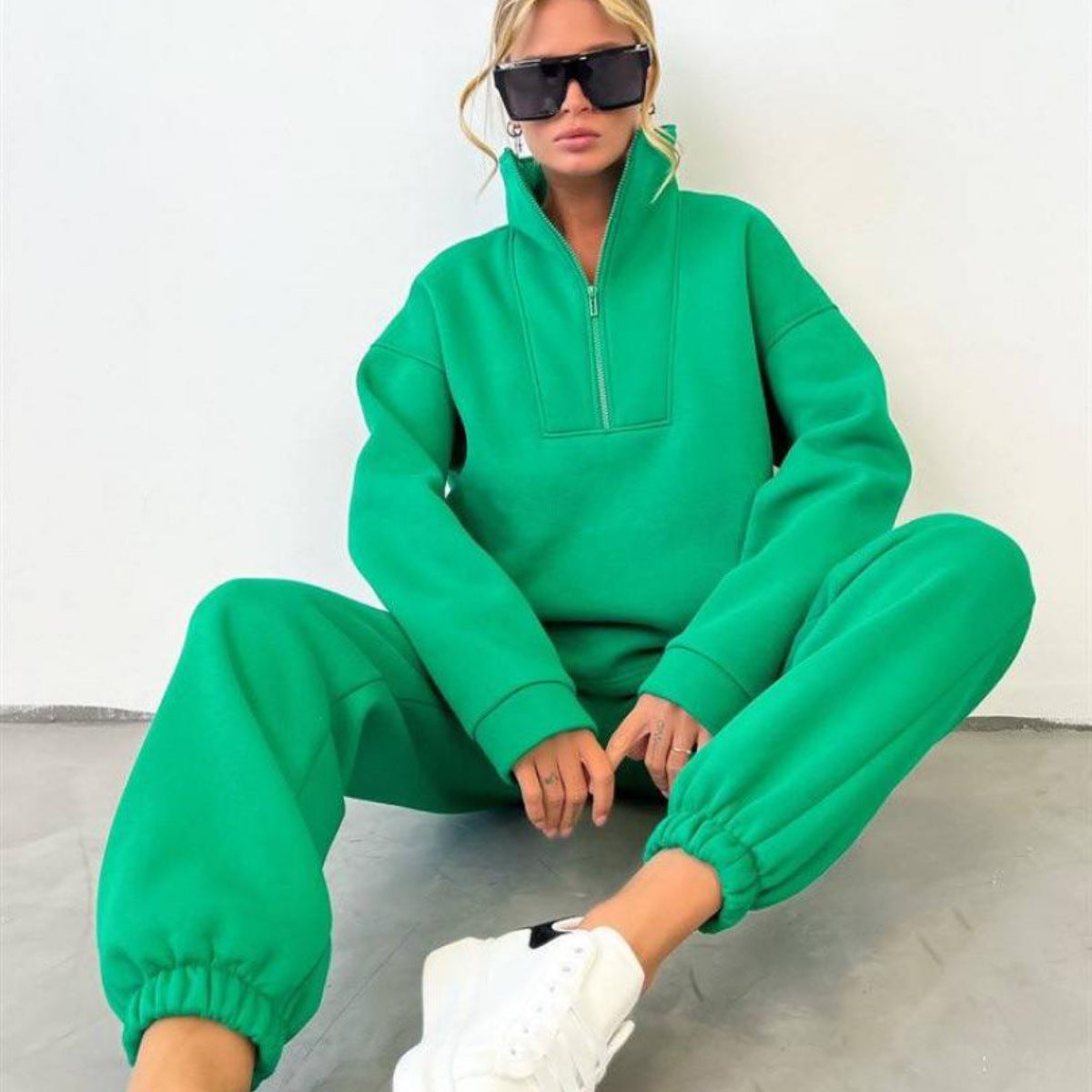 Women's oversized half-zip loungewear set displayed as a coordinated outfit