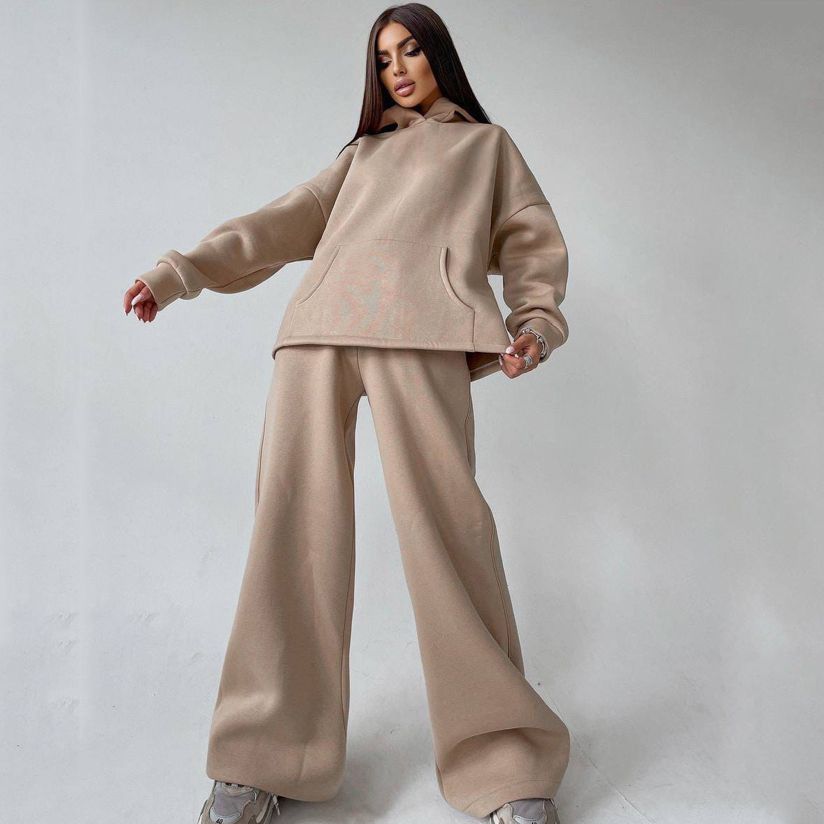 Women's oversized hoodie and flare pants set shown together