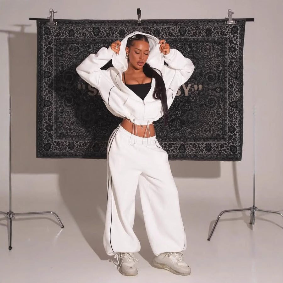 Front view of a women's tracksuit with a zip-front hoodie