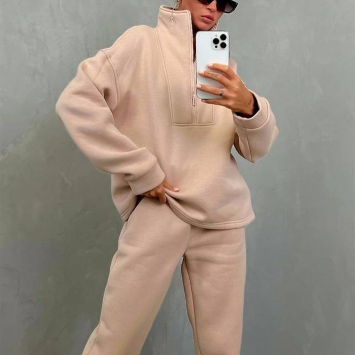 Women's loungewear top with a half-zip front and high stand collar