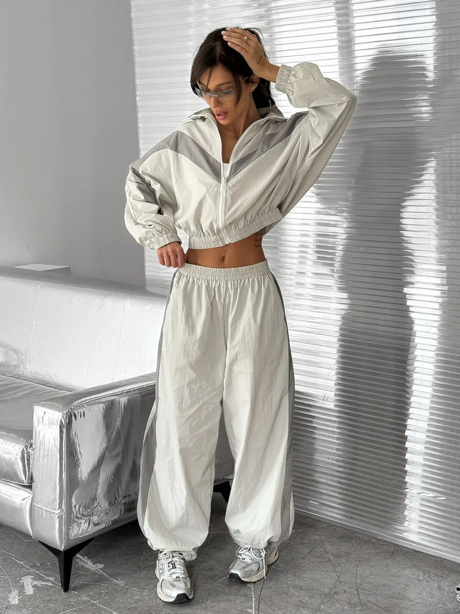 Women's satin track suit styled as a casual sporty outfit