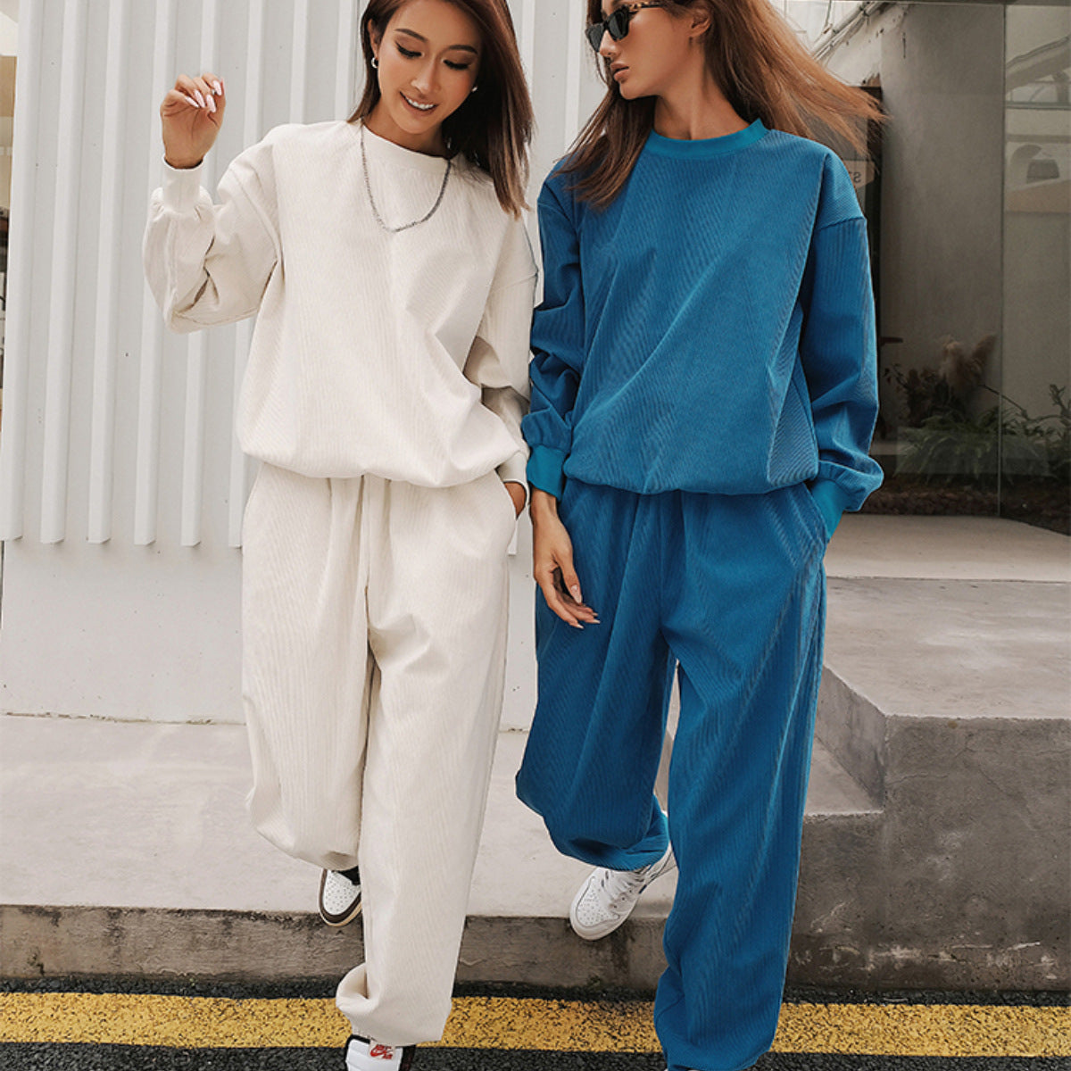Women's corduroy tracksuit set with a relaxed-fit top and matching jogger pants