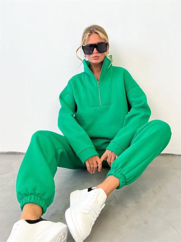 High stand collar and half-zip detail on the women's lounge top