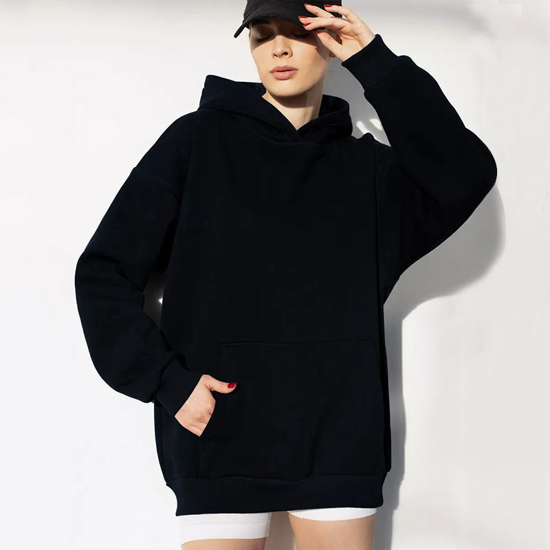 Side view of the oversized fleece hoodie showing its relaxed silhouette