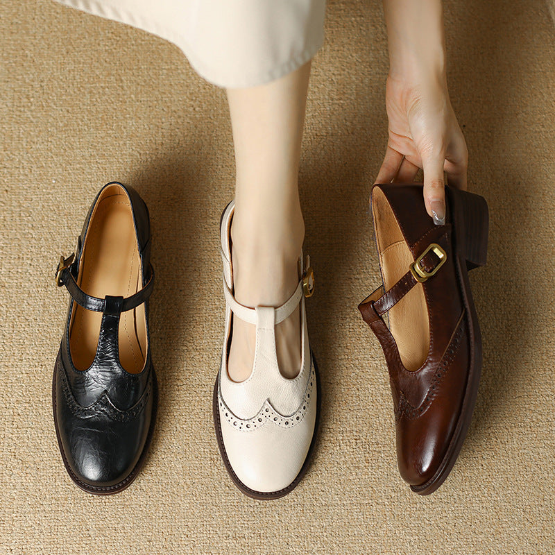 Pair of heeled dress shoes shown in a clean product view