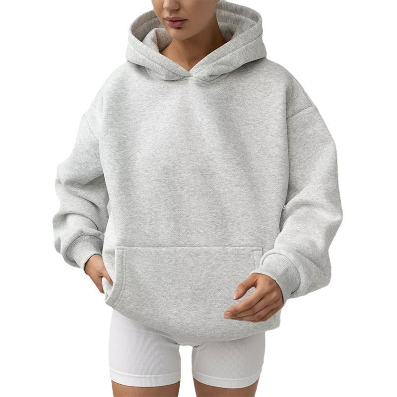 Back view of the women's hoodie highlighting the roomy oversized fit