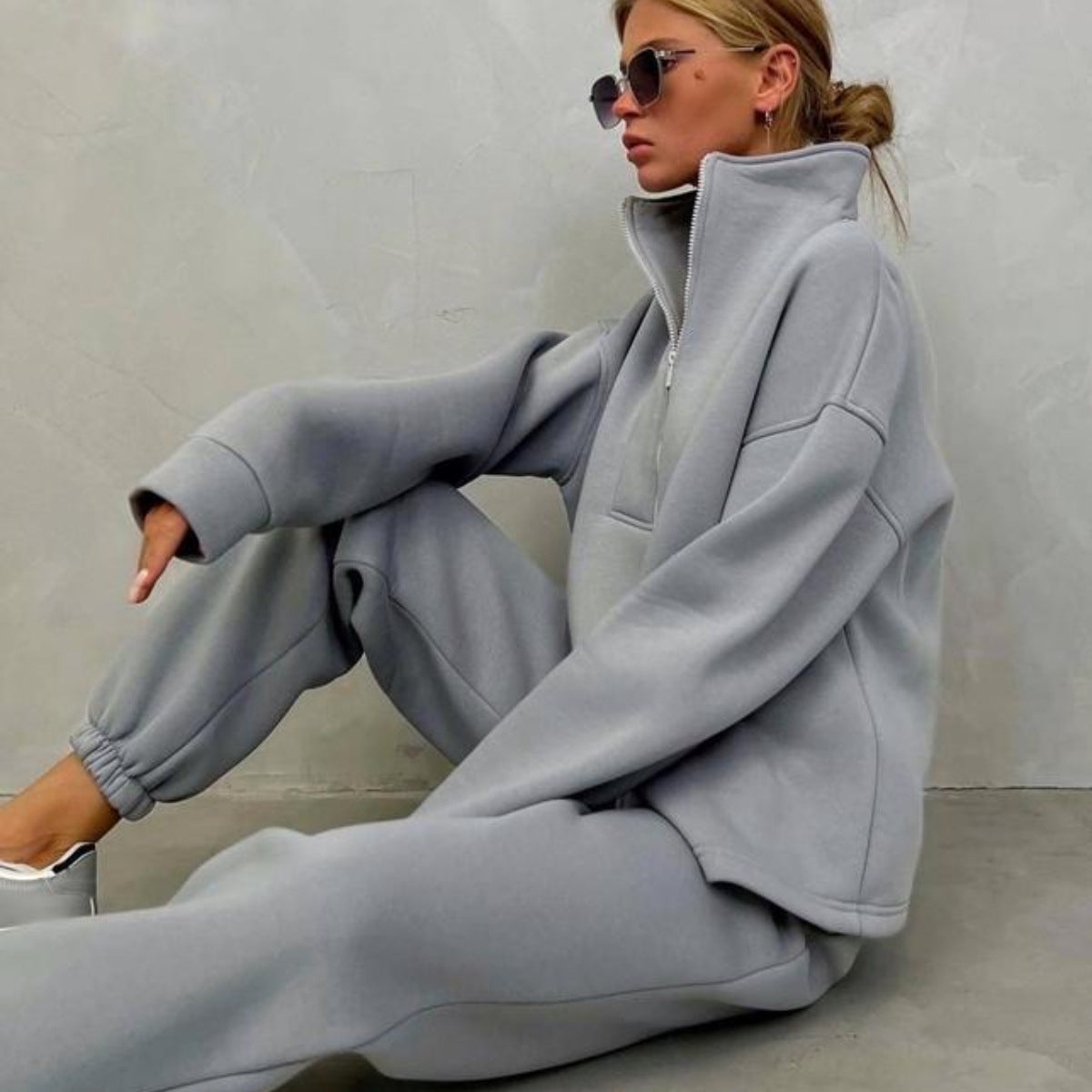 Oversized women's loungewear sweatshirt paired with jogger pants
