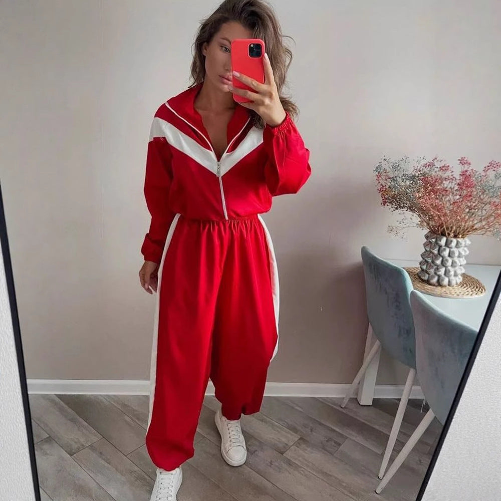 Detail view of the chevron stripe on a women's satin track suit