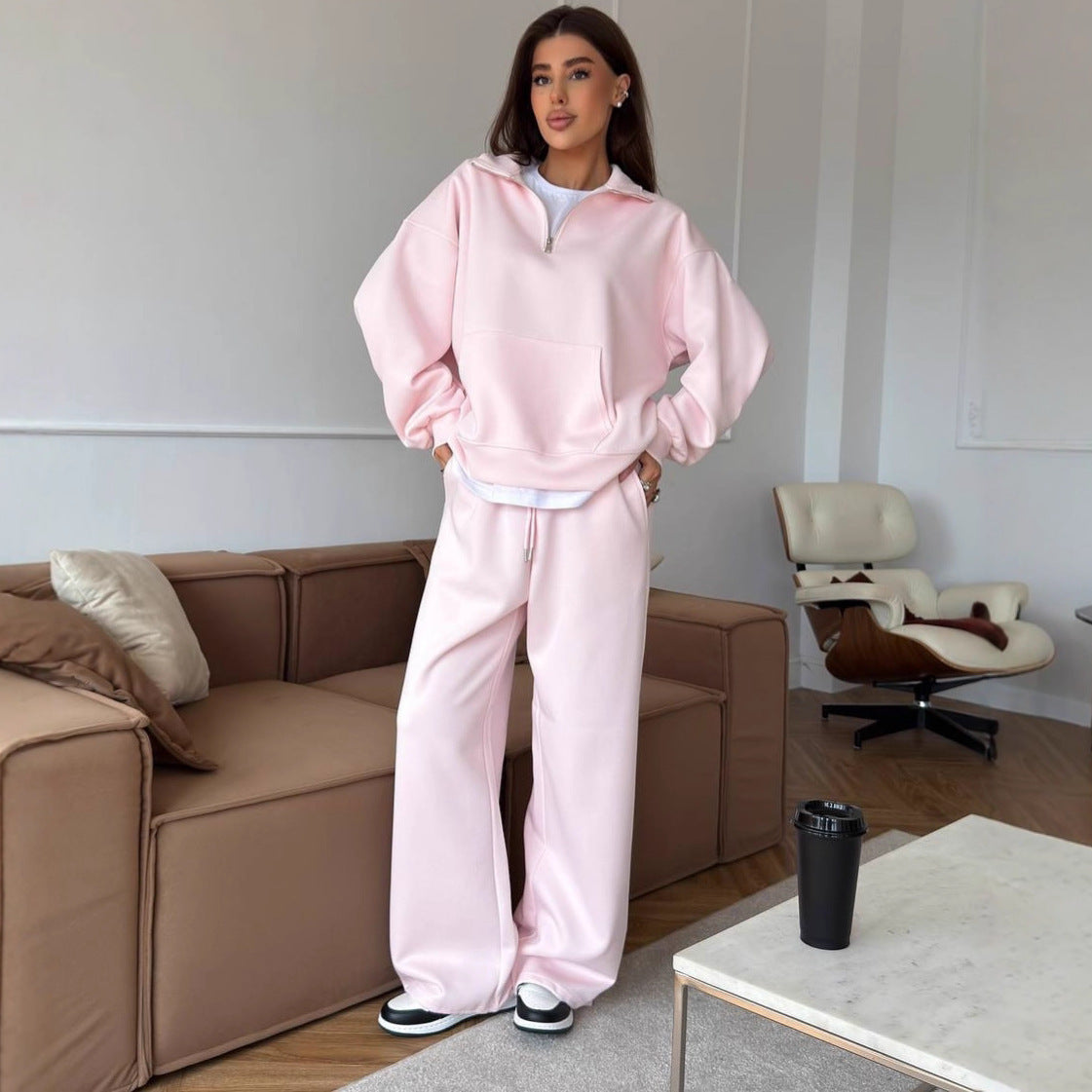 Women's lounge set featuring a half-zip hooded pullover