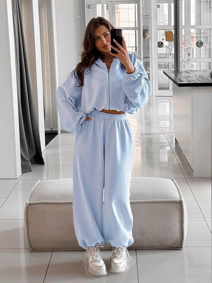 Women's jogger pants shown with tapered legs and a relaxed fit