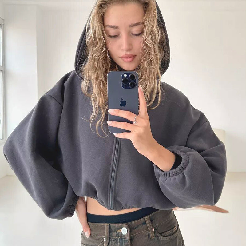 Women's oversized cropped hooded jacket shown from the front