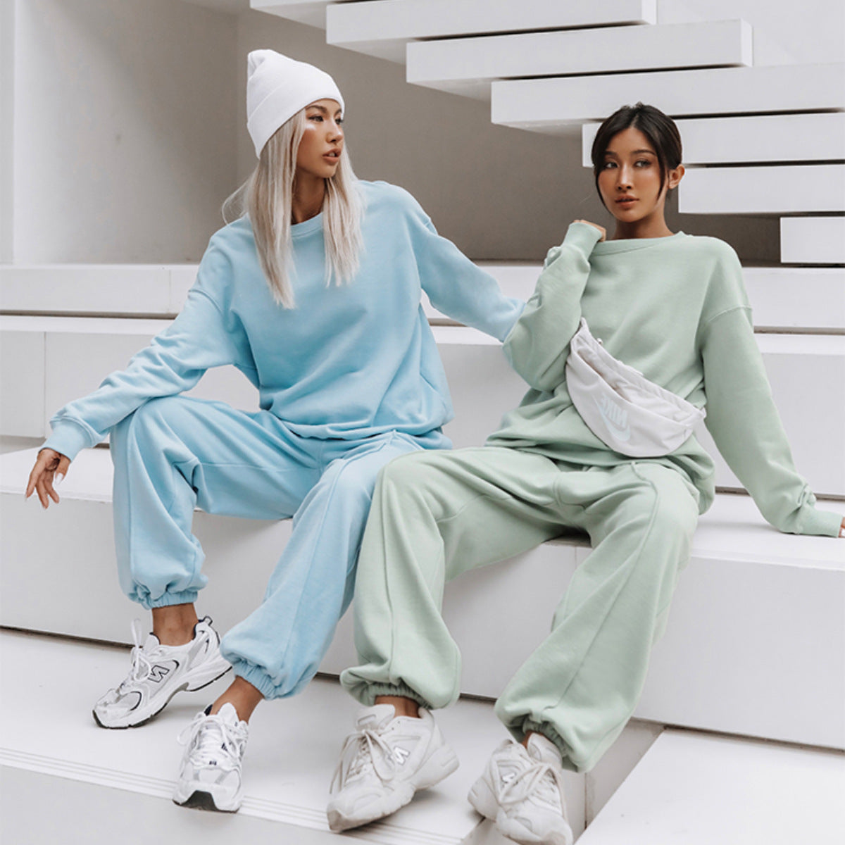 Women's vintage-washed lounge set with an oversized sweatshirt and wide-leg pants