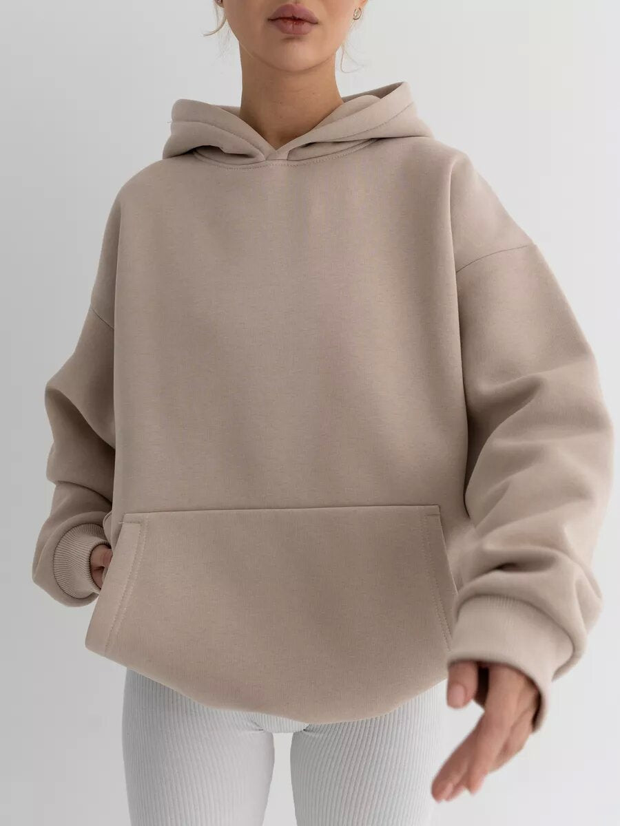 Women's fleece hoodie styled as a casual everyday layering piece