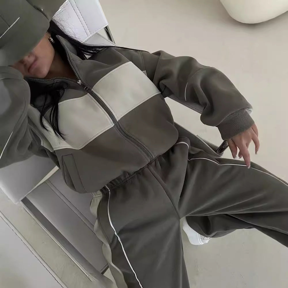 Women's two-piece tracksuit set with a full-zip jacket