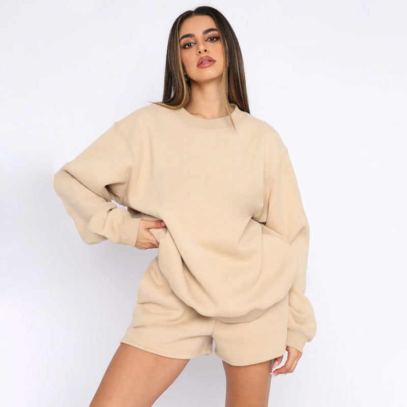 Front view of a women's terry sweatshirt and matching shorts set