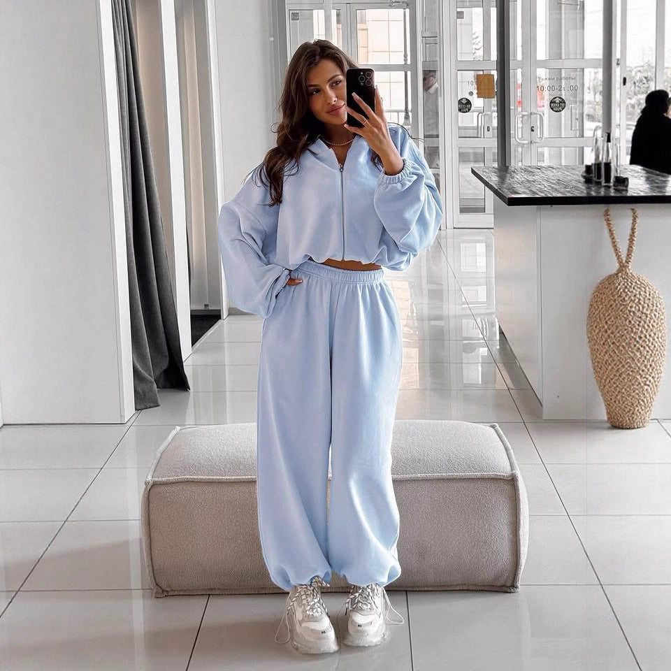 Women's lounge outfit featuring a full-zip oversized hoodie and joggers