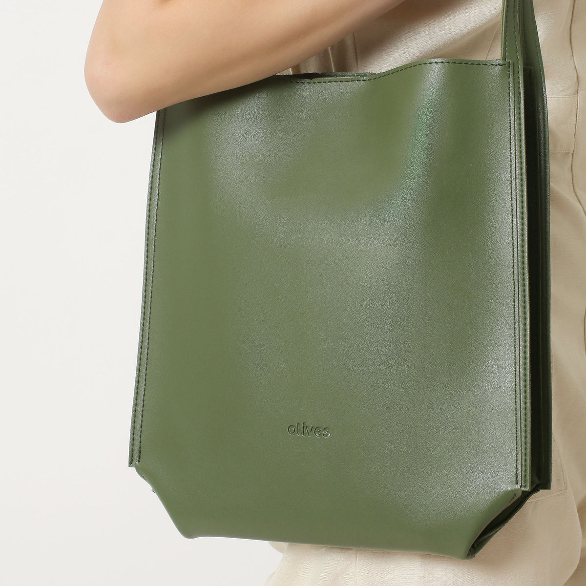 Olive green canvas and fawn leather suit case