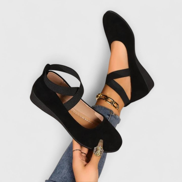 Orthopedic slip-on shoes with cushioned footbed shown from the side