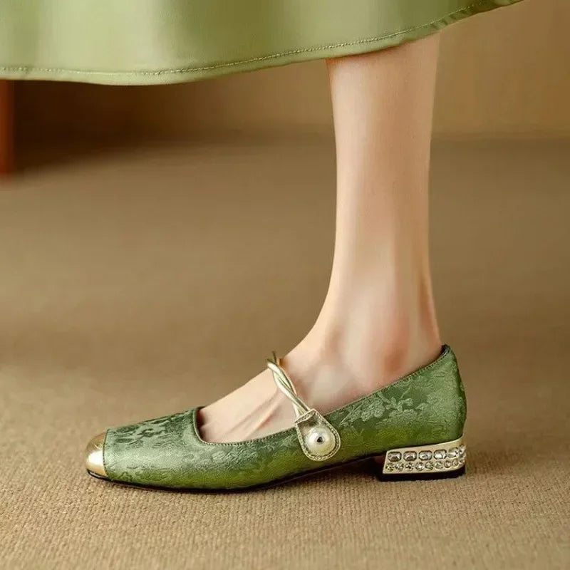 Women's heeled shoes shown from the front