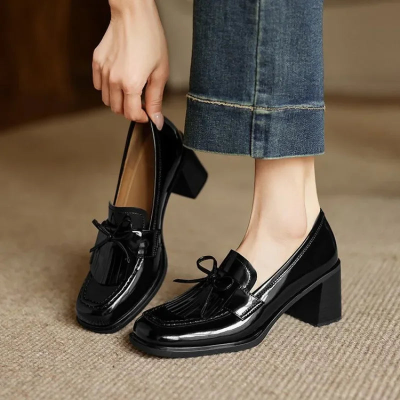 Women's heeled loafers displayed together for a polished everyday look