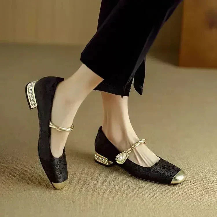 Classic heeled shoes paired with a formal dress