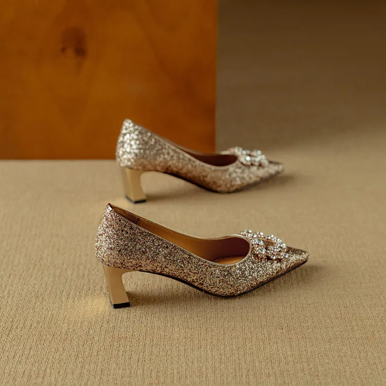 Women's pumps showing the medium heel profile