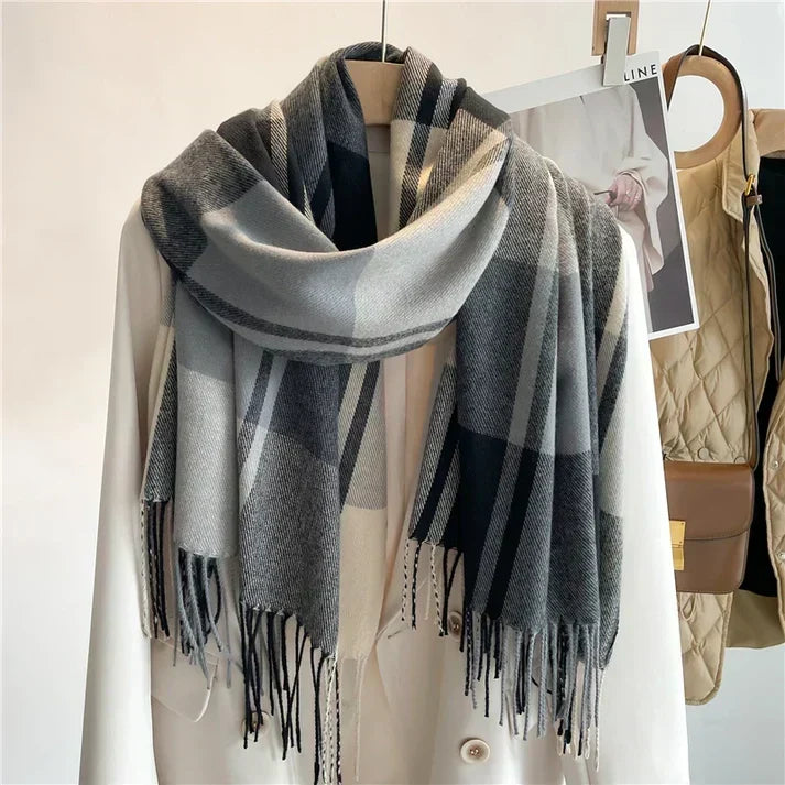 Versatile women's plaid scarf arranged as a cozy layered accessory