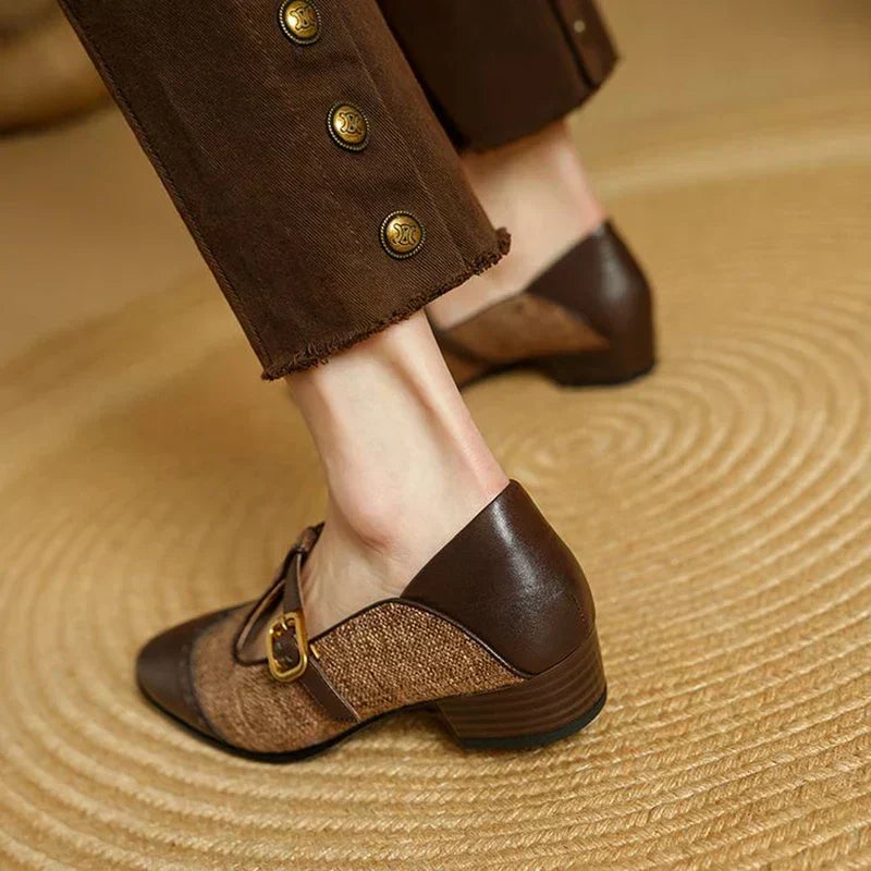 Pair of women's vintage buckle shoes displayed together