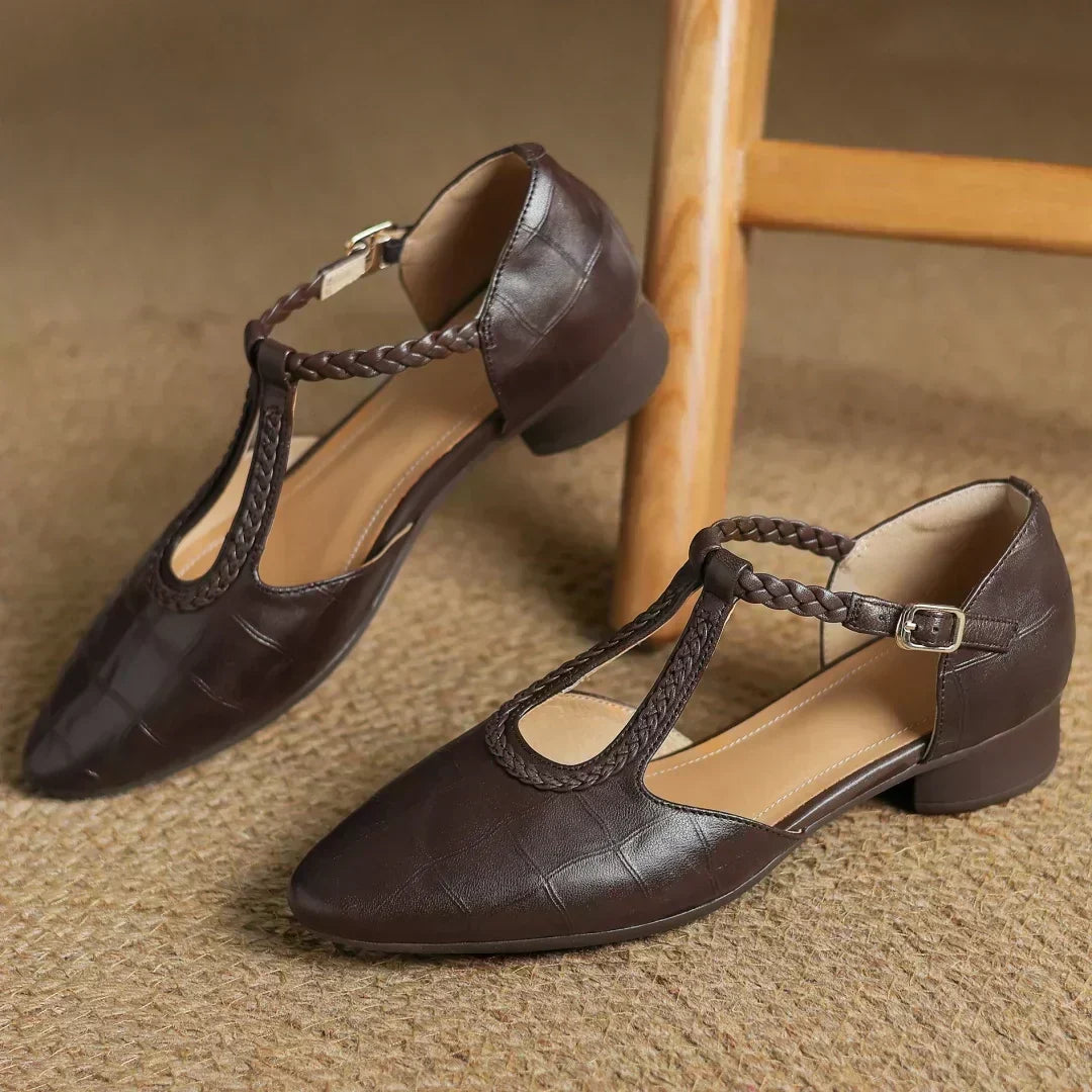 Angled view of women's T-strap shoes with classic styling