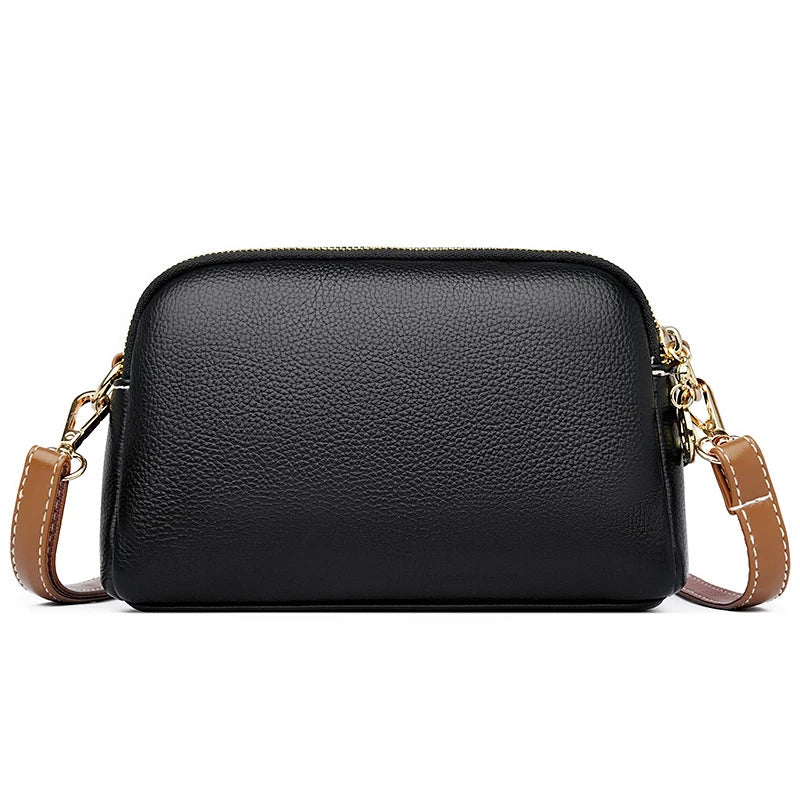 Women's handbag with organizer displayed upright on a clean background
