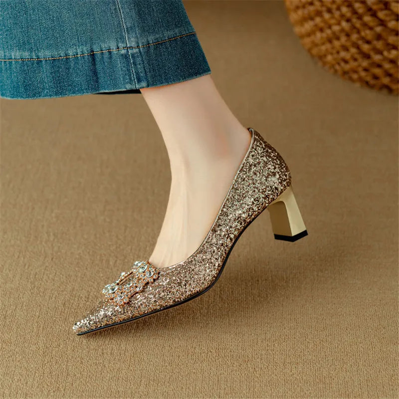 Front view of shiny women's pumps