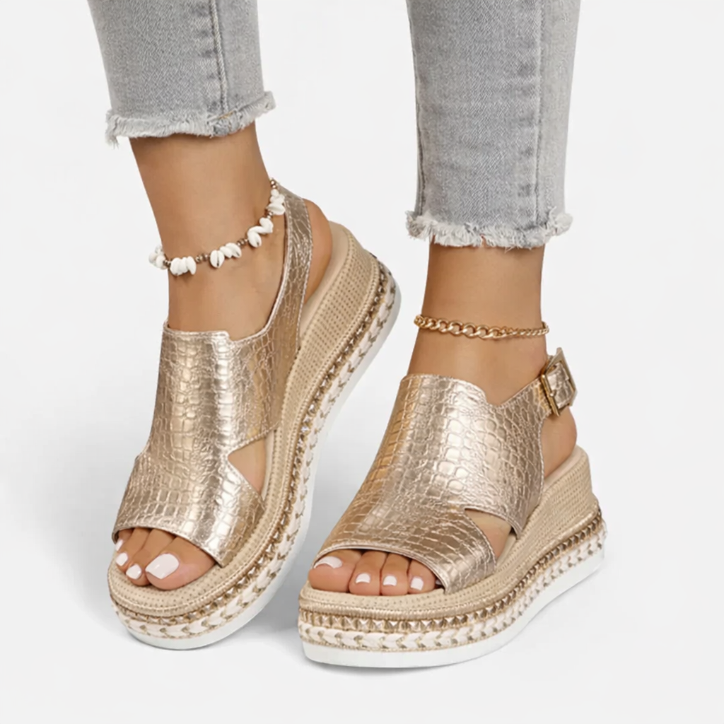 Side view of cushioned wedge sandals with a supportive heel