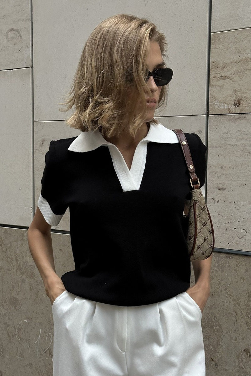 Front view of a short sleeve polo sweater with a contrast collar