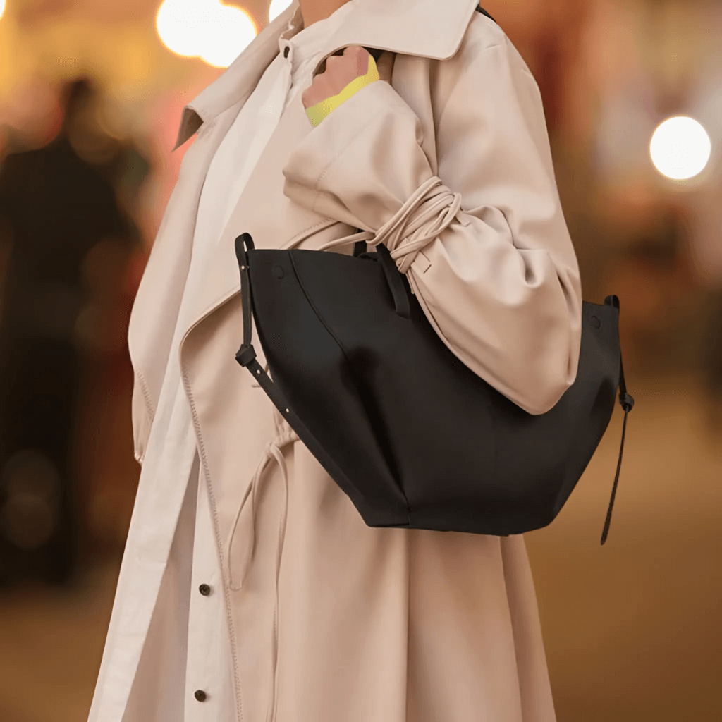 Back view of vegan leather crossbody bag with smooth structured finish