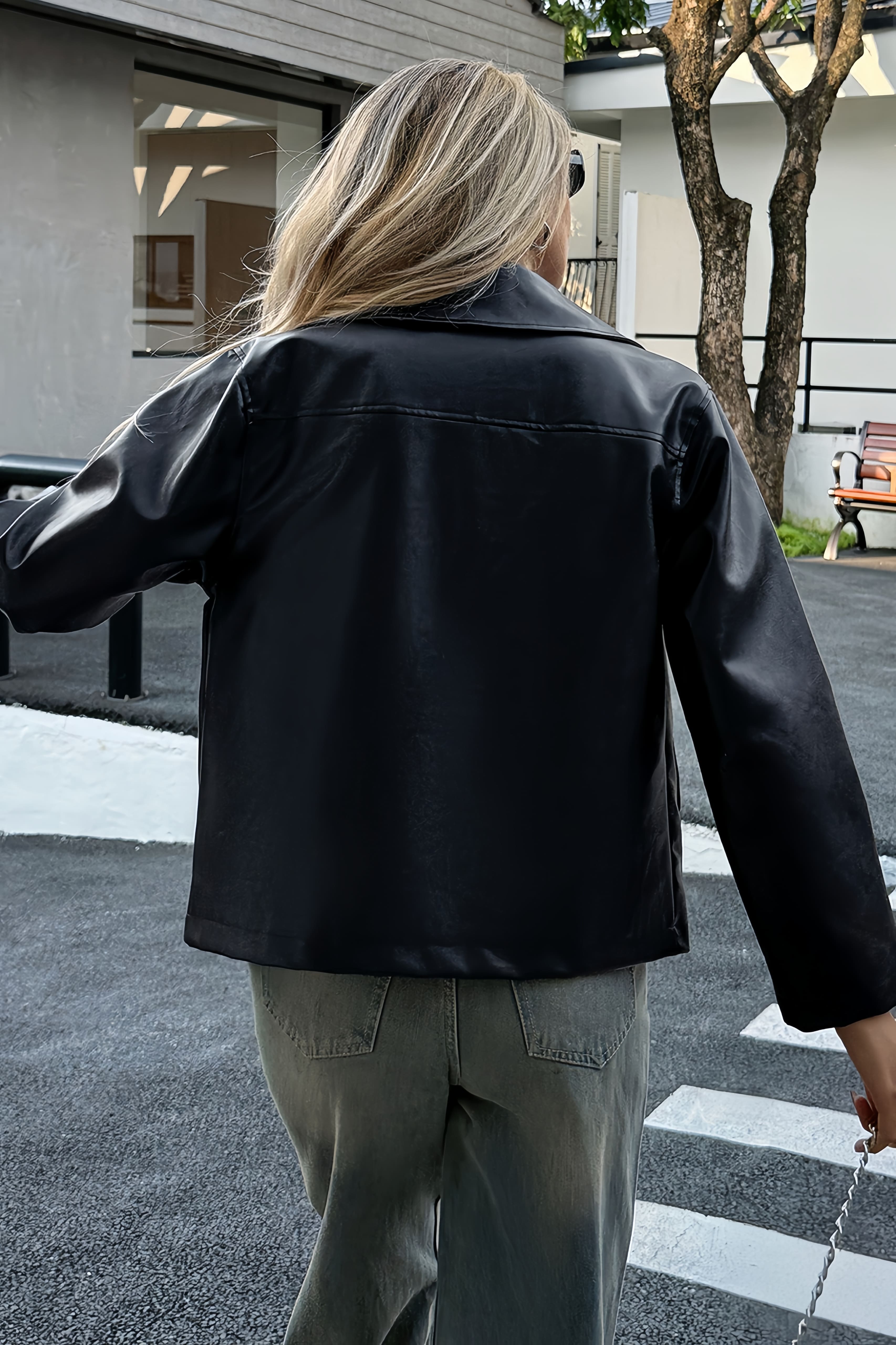 Side view of the zip jacket with structured outerwear styling