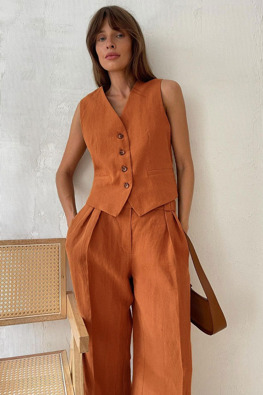 Close-up of buttons on the linen blend vest
