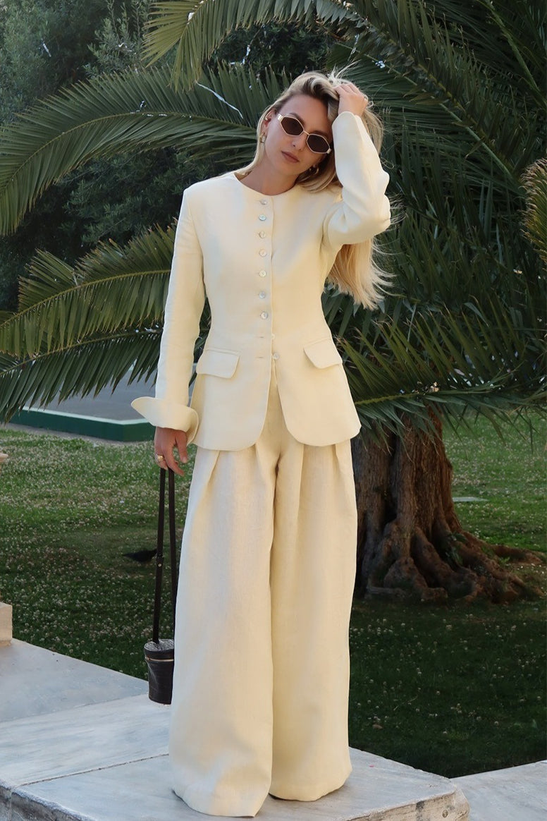 Close-up view of the tailored blazer and matching pants fabric
