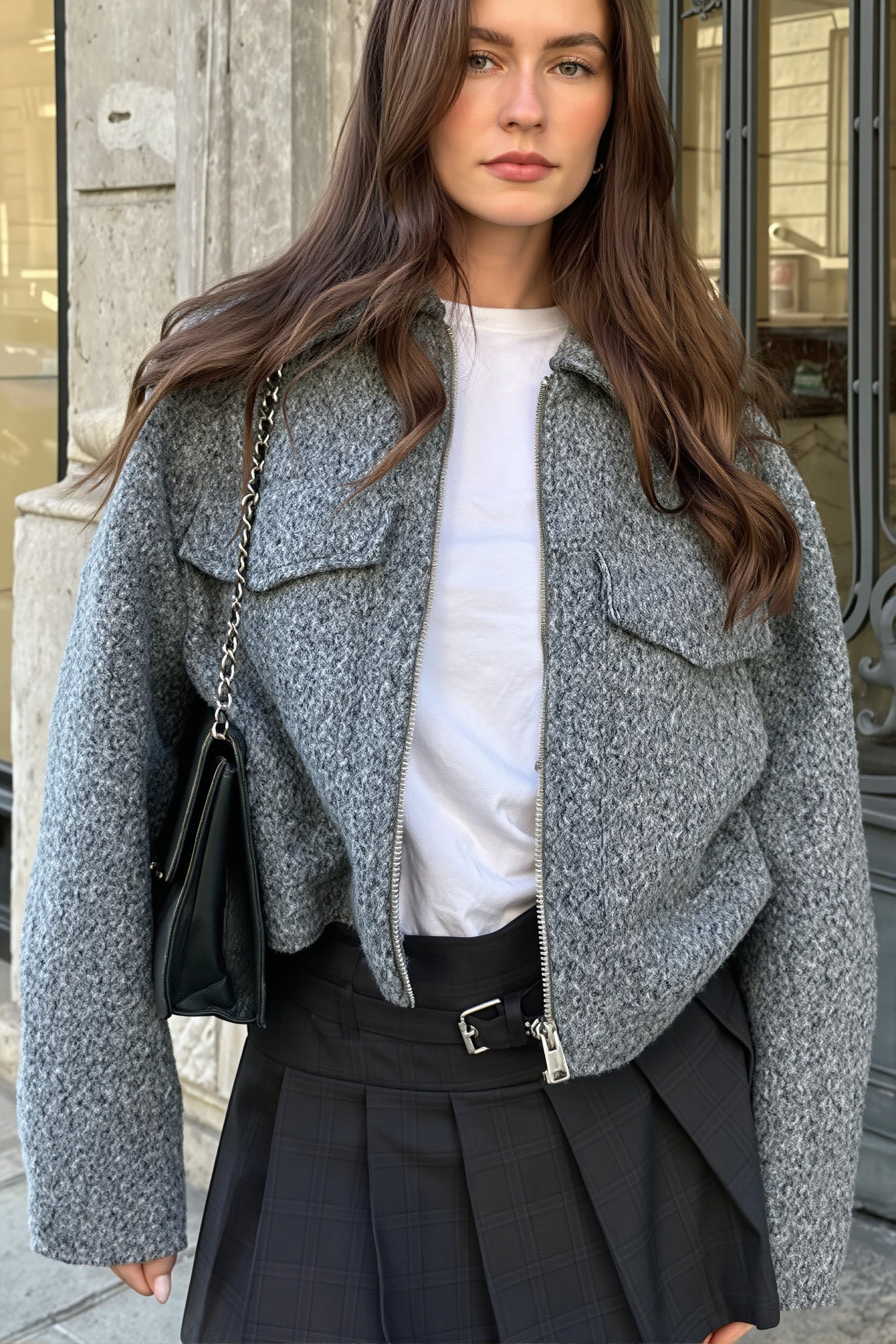 Textured bouclé cropped jacket shown from the front with a full front zip