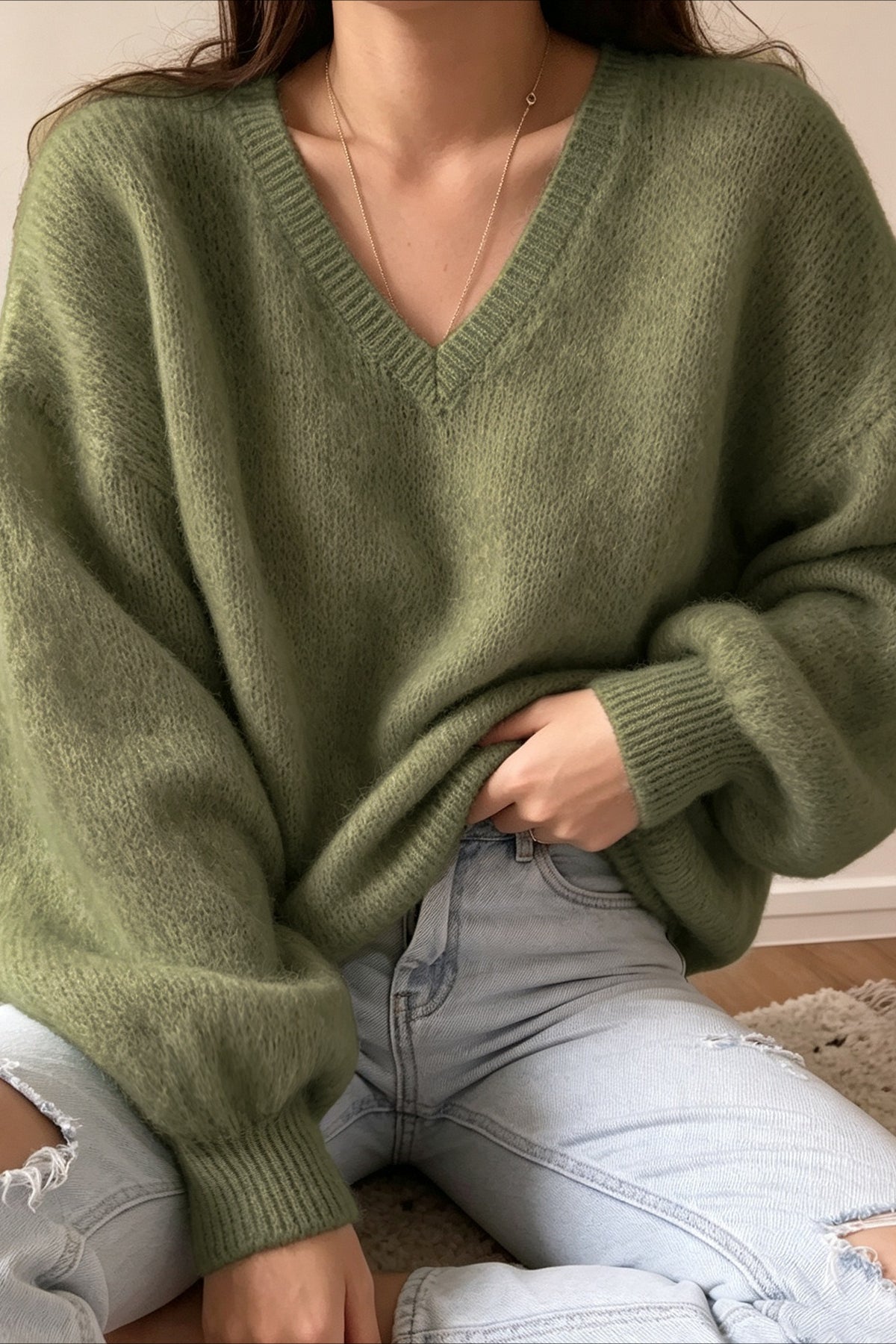 Side view highlighting the oversized fit and voluminous balloon sleeve