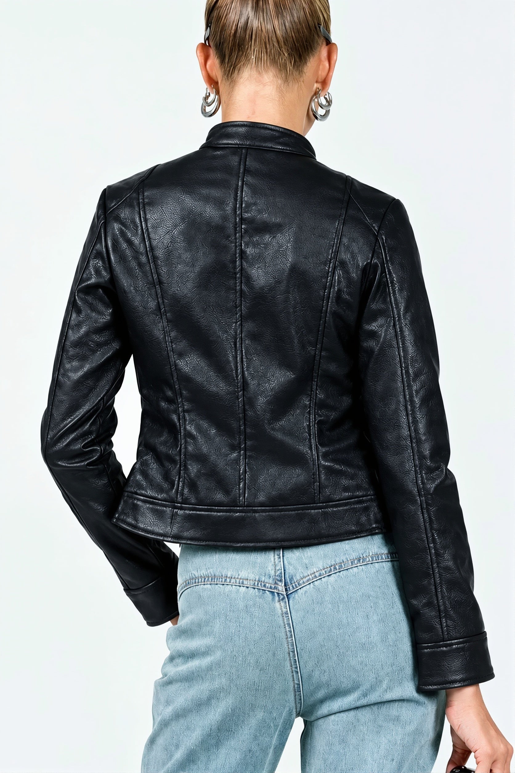 Women's faux leather moto jacket styled as an everyday outer layer