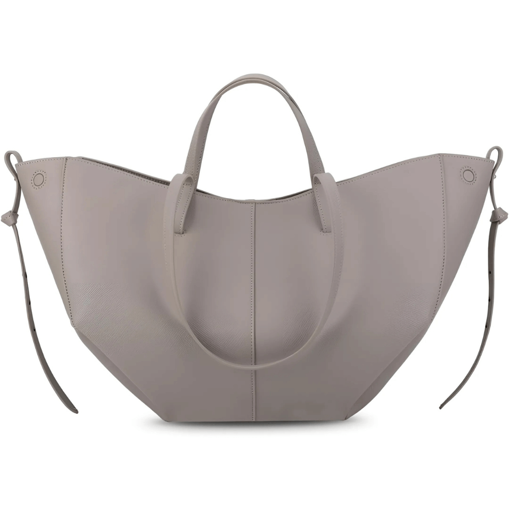 Compact vegan leather crossbody bag displayed with adjustable shoulder strap