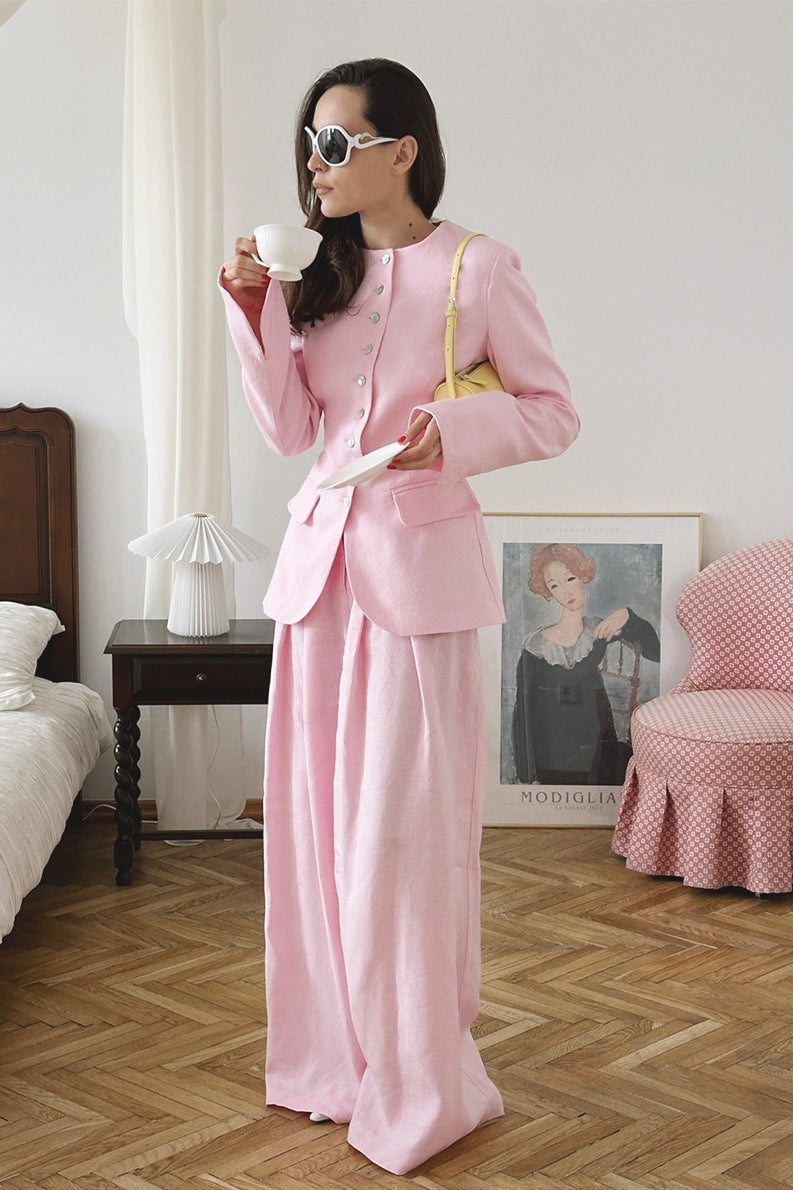 Front view of a tailored blazer with matching wide-leg pants